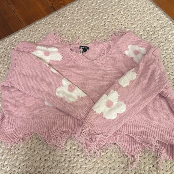 pink flower Rue 21 sweater
-good quality
-off the shoulder
-soft material - Picture 1 of 3